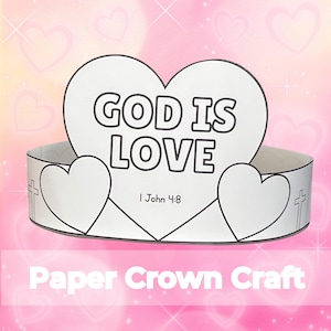 May include: A white paper crown craft with a heart-shaped centerpiece that reads "GOD IS LOVE" and "I John 4:8". The crown has heart and cross details. The words "Paper Crown Craft" are at the bottom.