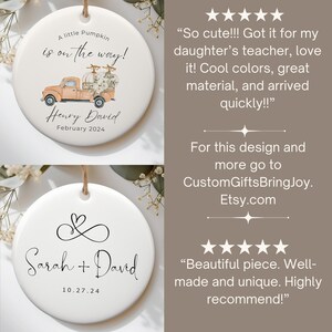 May include: Two white ceramic ornaments. The first ornament features a watercolor illustration of a truck carrying pumpkins with the text "A little Pumpkin is on the way!" and "Henry David February 2024". The second ornament features a black infinity symbol with a heart at the top and the text "Sarah + David 10.27.24".