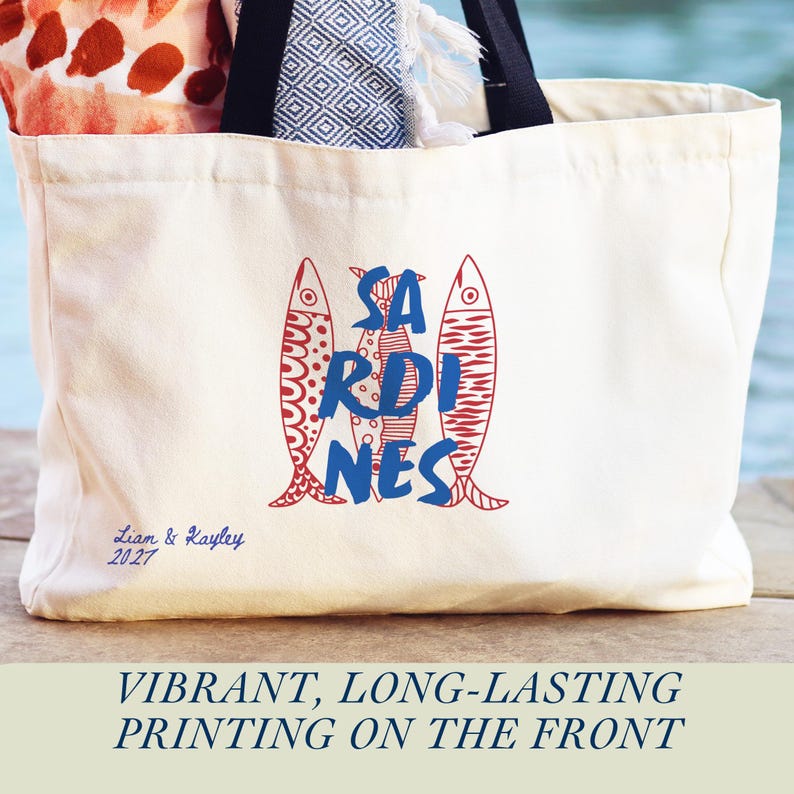 Sardines sailorcore Mediterranean Large zipper close canvas sardines tote bag for women with interior zipper pocket featuring bold blue and red sardine artwork and personalized name in script on cream coastal canvas. Sailorcore and sardinecore Mediterranean market bag style perfect as a coastal tote bag Italian summer beach bag and seaside gift with optional matching pencil pouch sold separately.