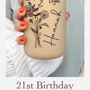Custom Birth flower for 21st birthday saying cocktail legal with the number 21 and personalized with name on a frosted glass tumbler. Birthflower and name 21 years old Colored birthflower on frosted glass tumbler