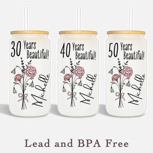 colored Birthflower personalized 
Glass tumblers for birthday gift birth month flower shown on three different tumblers 30 years beautiful 40th birthday 50 years old birthday gift with years old and name script in black flower is in color