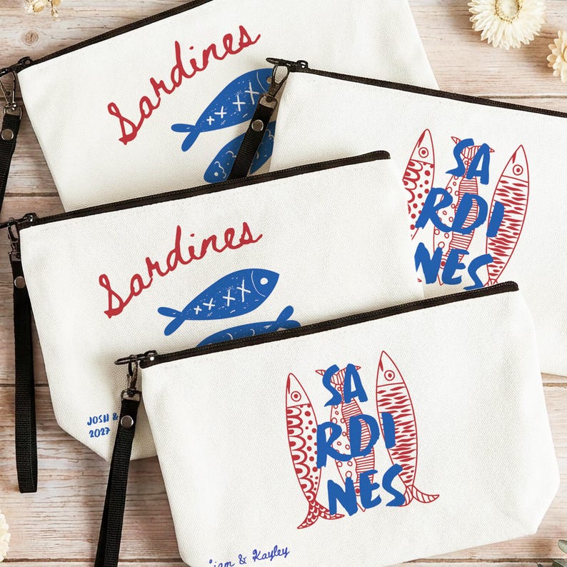 Sardines Mediterranean sailorcore personalized Zipper close canvas sardines makeup bag pencil pouch with bold blue and red sardine print and optional personalized name in script on cream coastal fabric. Sailorcore sardinecore and Mediterranean market girl aesthetic perfect for storing makeup pens and travel essentials and designed to coordinate with the large coastal sardines tote bag sold separately.