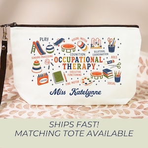 May include: A white zippered pouch featuring a colorful graphic print of occupational therapy tools and activities, including a slide, trampoline, crayons, and books. The text reads "OCCUPATIONAL THERAPY" and "Miss Katelynne" in blue script.