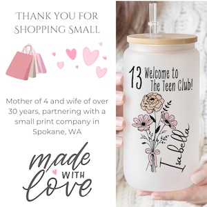 May include: White tumbler with a bamboo lid and a straw. The tumbler has a floral design with a pink and peach color scheme. The text "13 Welcome to The Teen Club!" and "Isabella" are printed on the tumbler.