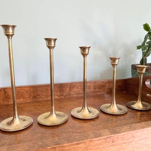 Set of 5 Graduated Brass Taper Candlesticks