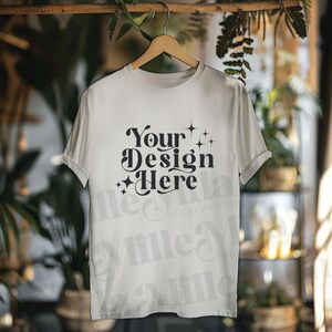 May include: White t-shirt mockup with the text "Your Design Here" printed on the front.