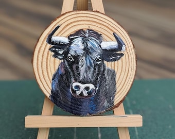 Hand painted wood slice. Aprox. 4” diameter. Various designs