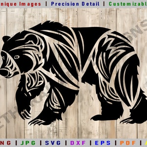 May include: Black and white silhouette of a bear with tribal-style patterns. The bear is standing on all fours and facing to the right. The image is on a woodgrain background.