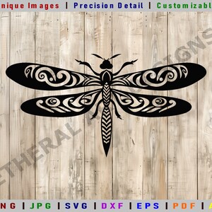 May include: Black and white silhouette of a dragonfly with intricate patterns on its wings. The dragonfly is centered on a woodgrain background.