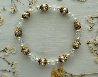 white pearls and gold beaded bracelet