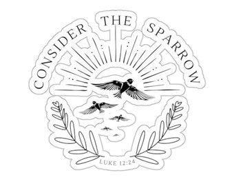 May include: Black and white sticker with a circular design. The text "Consider the Sparrow" is written around the outside of the circle. Inside the circle, there are multiple birds flying, a sun with rays, and a wreath of leaves. The text "Luke 12:24" is written at the bottom of the circle.