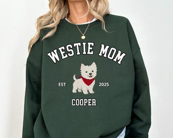 Cute personalized Westie Mom sweatshirt featuring a smiling Westie puppy, customizable with dog’s name and year