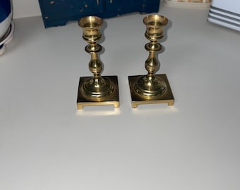 Vintage pair of brass taper candle holders.