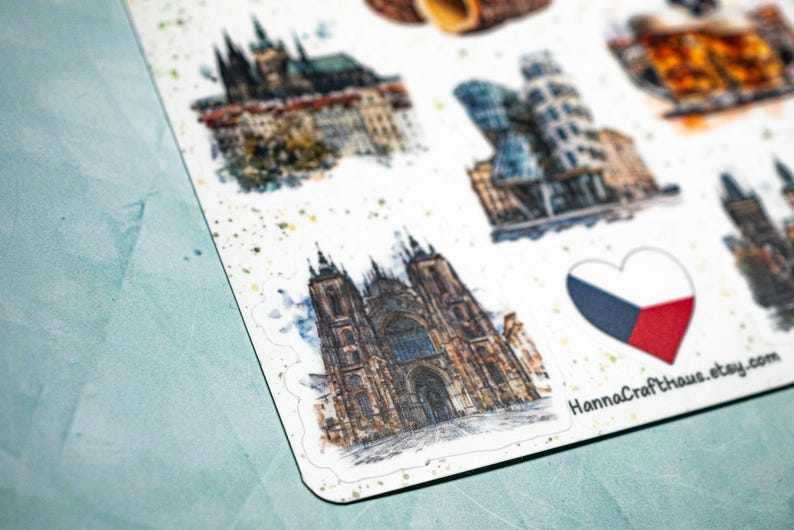 May include: A sheet of stickers featuring watercolor illustrations of Czech Republic landmarks. The stickers include images of Prague Castle, the Dancing House, and St. Vitus Cathedral. A heart-shaped sticker with the Czech flag is also included.