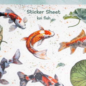 May include: A sticker sheet with a white background featuring colorful koi fish and green lily pads. The sheet is titled "Sticker Sheet koi fish".