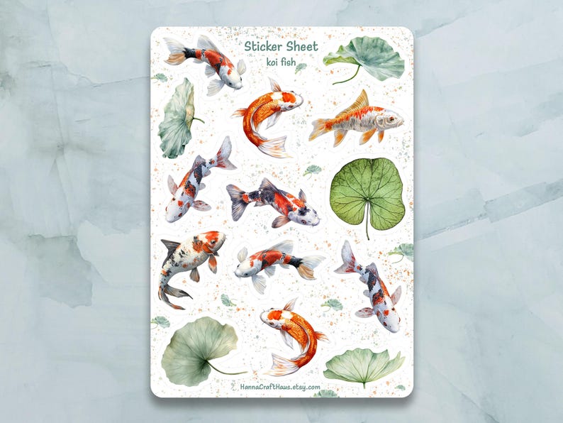 May include: Sticker sheet with watercolor illustrations of koi fish and lily pads. The sheet says "Sticker Sheet koi fish" at the top.