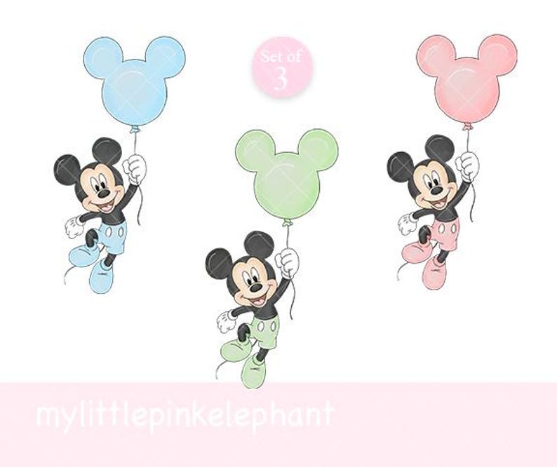 May include: Three illustrations of Mickey Mouse holding balloons. Each Mickey Mouse is dressed in different coloured shorts and shoes, with a matching balloon. The balloons are light blue, green, and pink. The text "Set of 3" is in a pink circle.