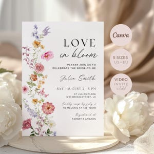 May include: A white invitation card with the text "LOVE in bloom" and floral accents in pink, orange, and purple. The invitation includes details for a bridal celebration, with the name Julia Smith and RSVP information. Additional text includes "5 SIZES US+EU" and "VIDEO INVITE included".