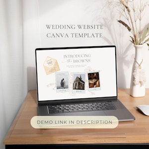 May include: A laptop displays a wedding website Canva template with the text "Introducing the Browns." The screen shows a wedding invitation and three photos. The laptop sits on a wooden desk with a vase of dried flowers.