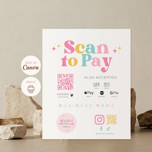 May include: A white sign with the text "Scan to Pay" in pink, yellow, and blue. It includes QR codes for Venmo and a business name, along with payment options like Apple Pay and Google Pay. The sign also has the text "Edit in Canva" and "Print".