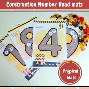 May include: Construction themed number road mats for kids to trace the numbers 1, 2, 4, and 8. The mats are yellow and gray with a construction theme. The mats are labeled with the number words "One", "Two", "Four", and "Eight".