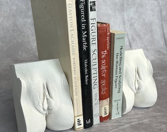 Vulva bookends. Life cast “yoni” sculpture created by a professional body casting artist and sculptor near San Francisco.