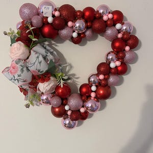 Heart-Shaped Red and Pink Ornament Wreath with Floral Accents