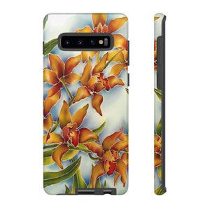 May include: A phone case with a design of orange and yellow orchids on a blue and white background.