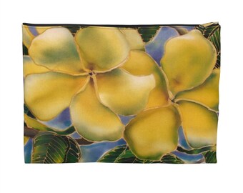 May include: A yellow and green floral print zippered pouch with a blue background. The pouch is made of fabric and has a zipper closure.