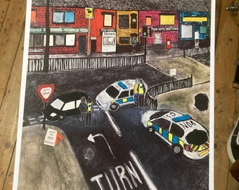 May include: An artistic print of a street scene with buildings, police cars, and figures. The artwork features a dark colour palette with a focus on the street and the buildings. The words "TURN" and "Give your distance" are visible.