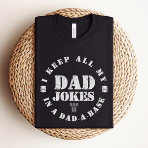 May include: A set of three ceramic mugs with a speckled, matte finish. The mugs are in shades of cream, light gray, and dark gray. Each mug has a simple, minimalist design, perfect for coffee or tea.