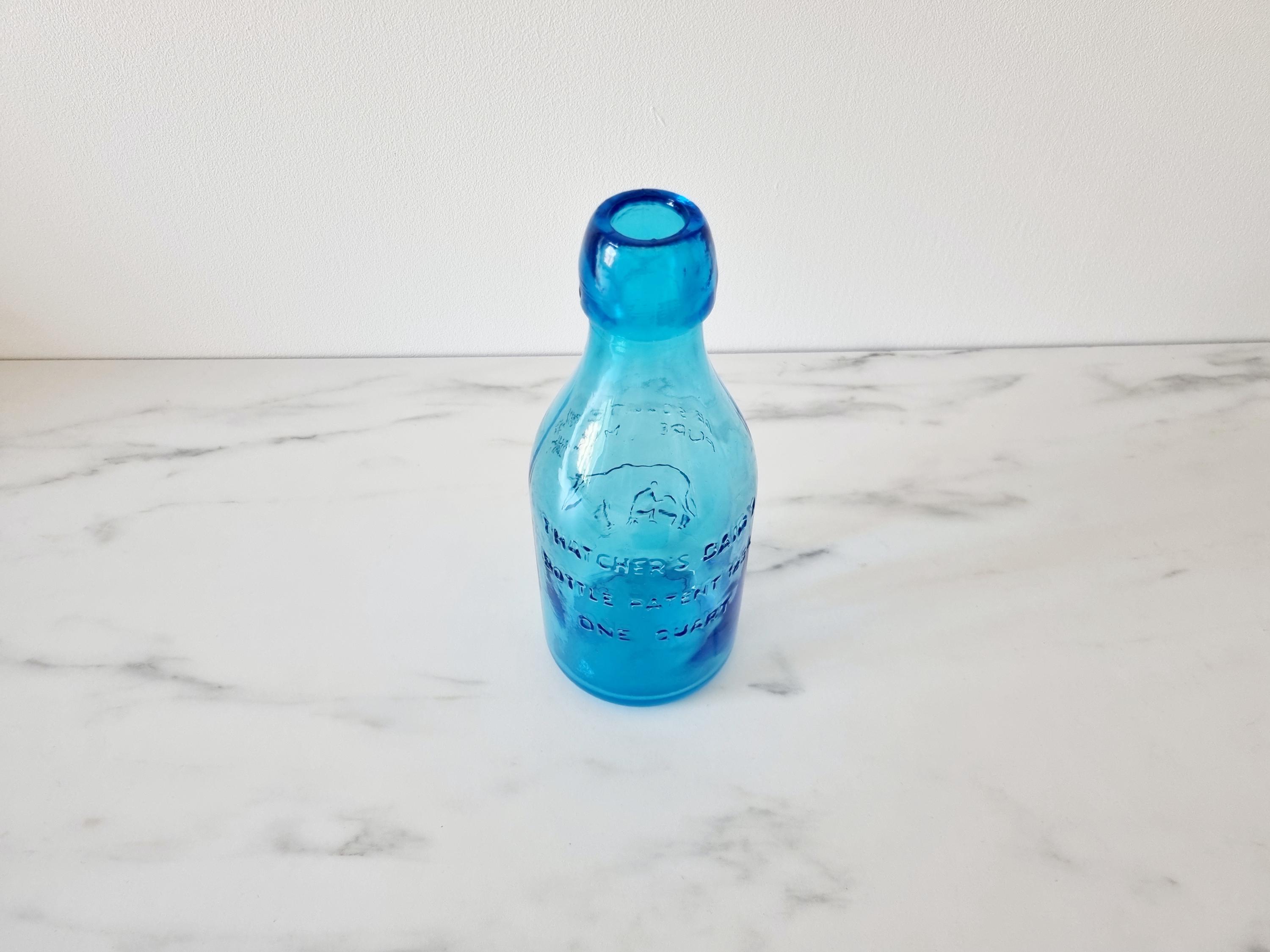 ヴィンテージの青いガラスの牛乳瓶：サッチャーの乳製品の花瓶 - Etsy 日本