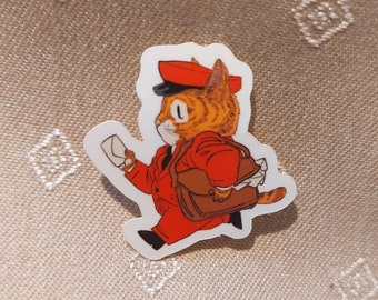 Puede incluir: Una pegatina de un gato de dibujos animados que lleva un uniforme y un sombrero de cartero rojo, llevando una cartera marrón y una carta. El gato camina y mira hacia la derecha.