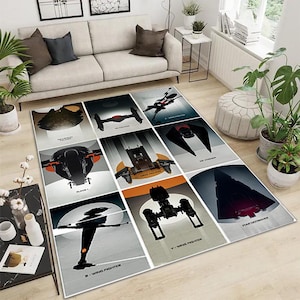 May include: A rectangular area rug featuring nine panels with stylized illustrations of spacecraft. Each panel has a different ship design, with text labels including "Millennium Falcon", "TIE Fighter", and "Slave 1". The rug is on a light-colored wooden floor.