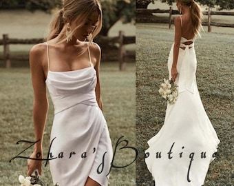 Stunning Mermaid Wedding Dress Elegant White Gown with Spaghetti Straps, High Slit, and Sweep Train - Backless Satin Perfection