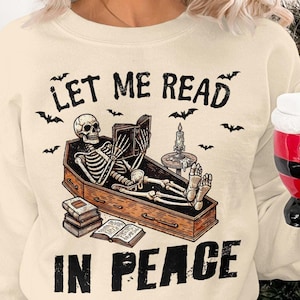 Let Me Read In Peace Halloween Skeleton Sweatshirt, Book Lover Skeleton Sweatshirt, Cozy Halloween Sweatshirt, Funny Skeleton Reading Shirt