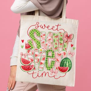 Eco-friendly cream canvas tote bag featuring a colorful summer saying design for grocery shopping or beach trips