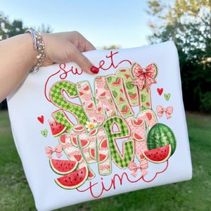 Minimalist fruit themed artwork displayed on a clean white canvas pouch, ideal for beach essentials