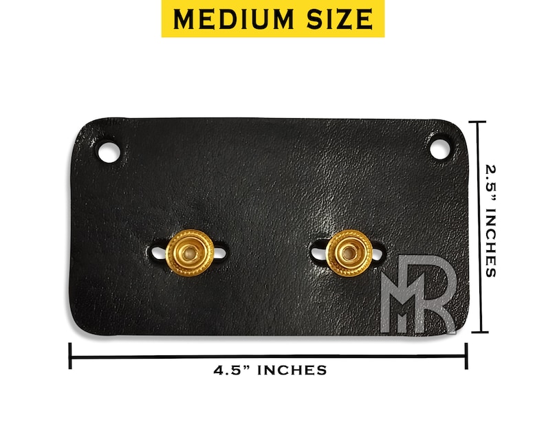 May include: Black leather wallet with two gold metal snaps and the initials "MR" embossed on the bottom right corner. The wallet measures 4.5 inches wide and 2.5 inches tall.