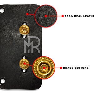 May include: A black leather wallet with brass buttons and the text "MR" embossed on the front. 100% real leather.