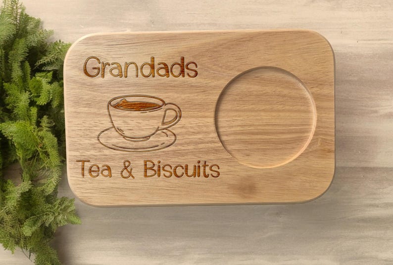 Close-up of laser engraved Grandad's name on wooden tea tray – custom personalised gift idea
