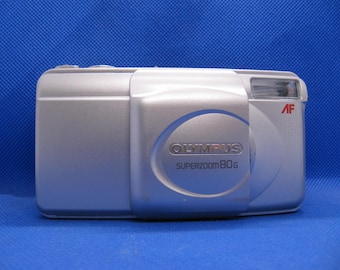 Olympus mju-II Zoom 80 mit Etui - Clean Cameras | Markus Säuberli