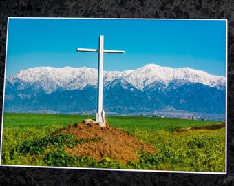 13" X 19" Photo of wooden cross and snow covered mountains in background