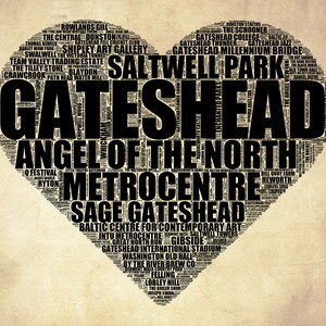 May include: A black and white word cloud in the shape of a heart, with the word "Gateshead" in large letters at the centre. The word cloud includes landmarks and places of interest in Gateshead, England, such as the Angel of the North, Saltwell Park, and the Sage Gateshead.