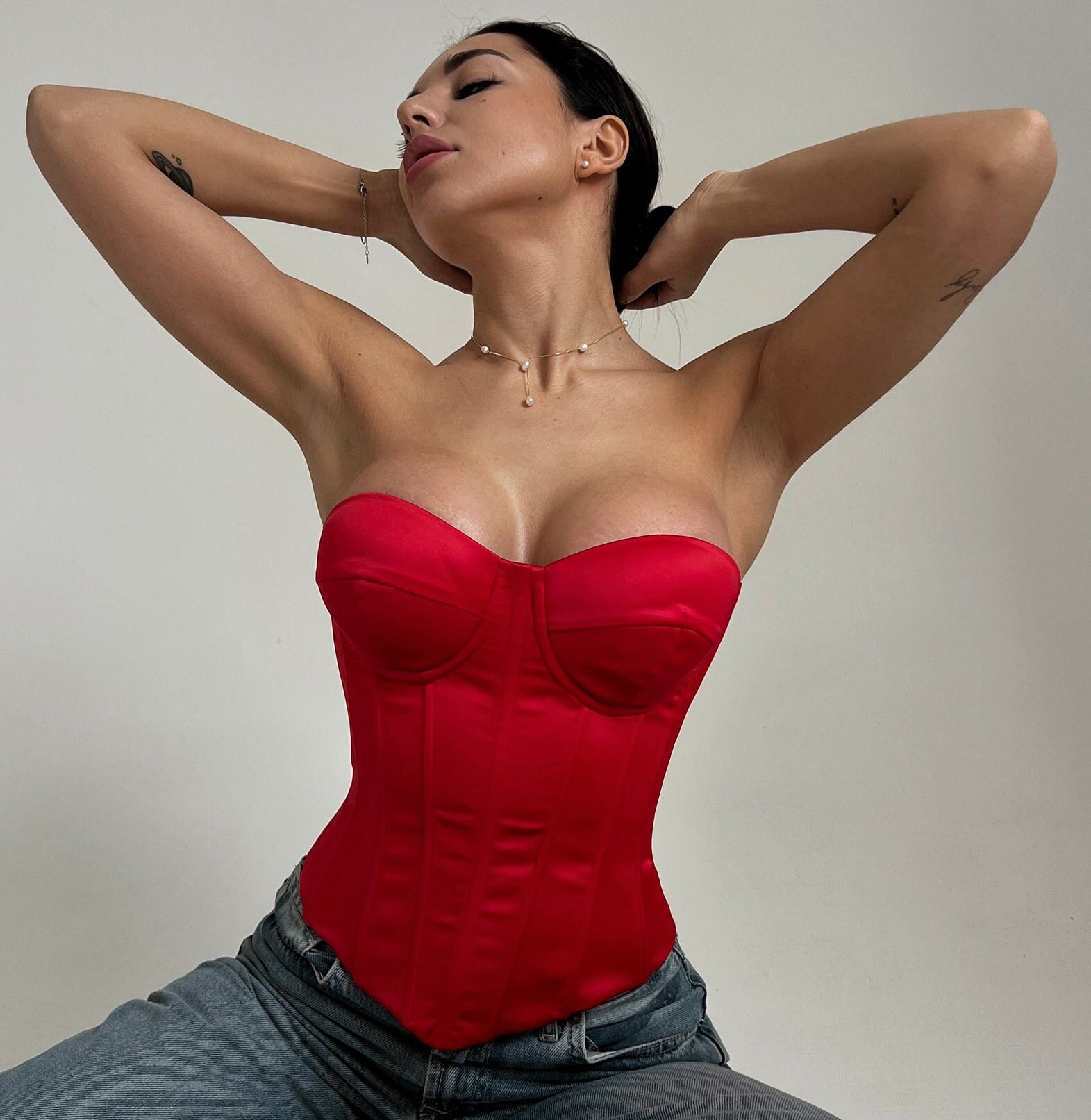 red satin corset top