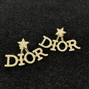 Vintage DIOR Gold Tone Star Stud Earrings