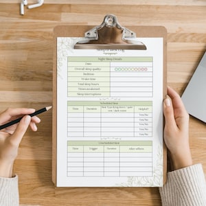 May include: A clipboard with a printed sleep log, featuring sections for night sleep details and scheduled rest. The log includes fields for date, sleep quality, and sleep interruptions. A hand holds a pencil, ready to fill out the log.