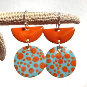 Earrings with turquoise and orange enamel and silver hooks