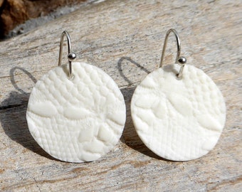 Earrings made of porcelain with relief and silver hooks