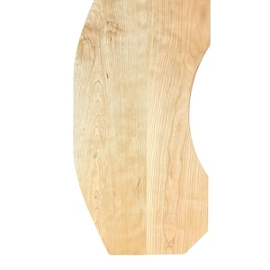 May include: A light-colored, wooden, irregularly shaped board with a curved edge. The wood grain is visible, and the board has a smooth surface. The board is likely for woodworking or crafting projects.